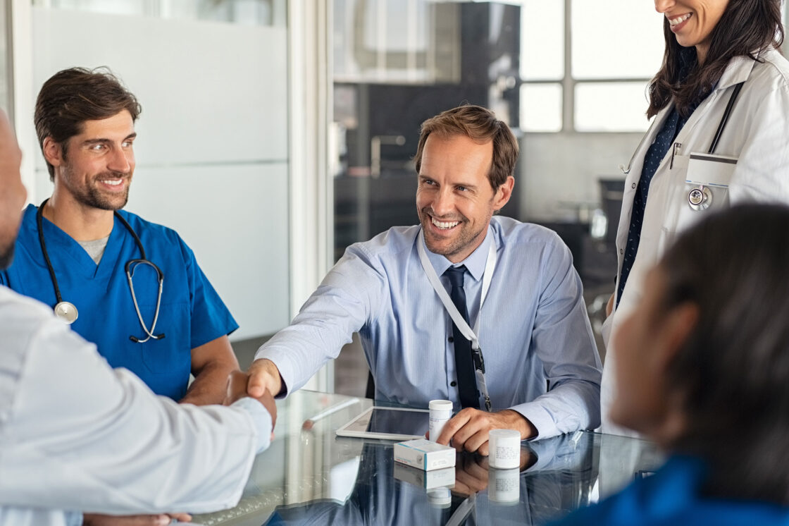 male pharma rep engaging with healthcare providers