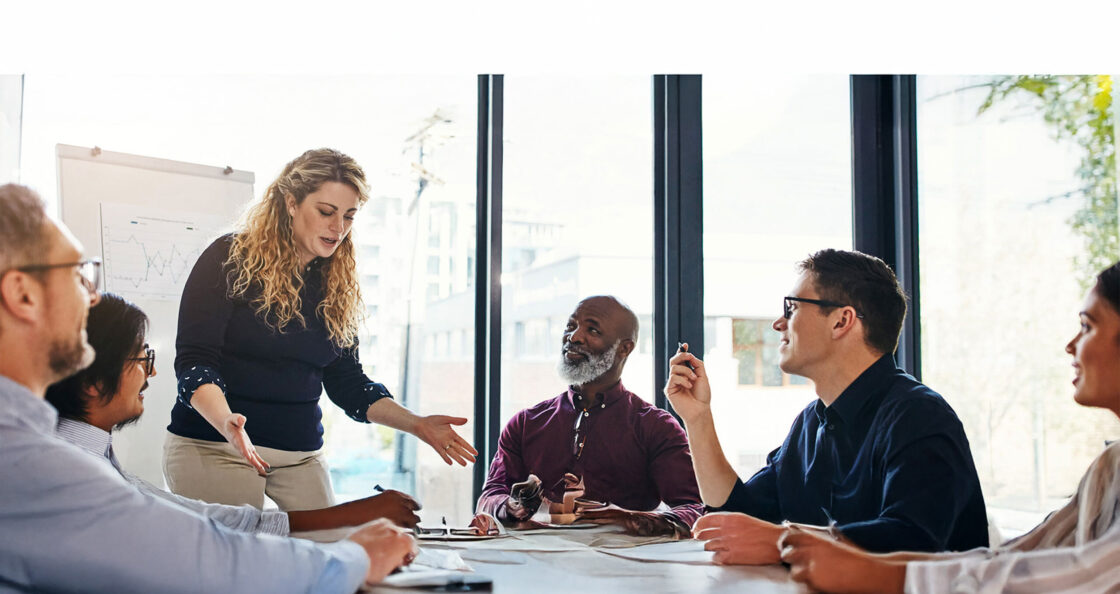 Business people meeting, diversity and speaker presentation, manager speech or leader finance investment proposal. Communication, teamwork workshop or mentor coaching, teaching or training sales team.