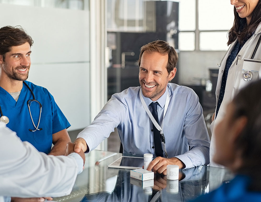 male pharma rep engaging with healthcare providers