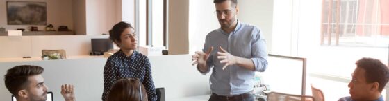sales leader speak to team in casual work setting