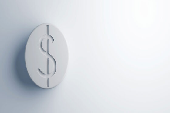 Dollar sign on top of round white pill