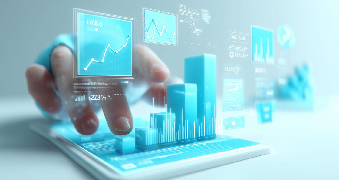 hand controlling tablet with overlaying graphs and charts