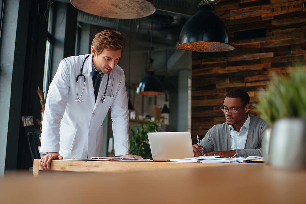 doctor speaking with sales team