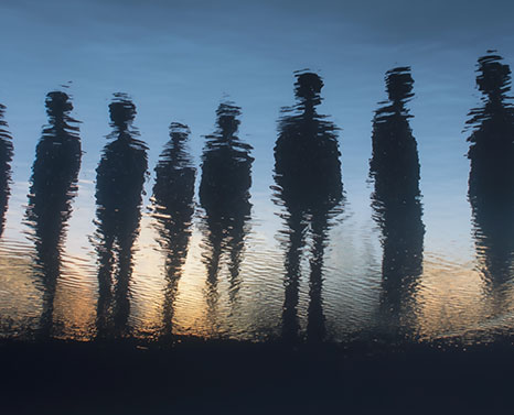 human silhouettes through water
