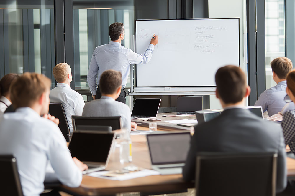 a group of professionals attending executive training
